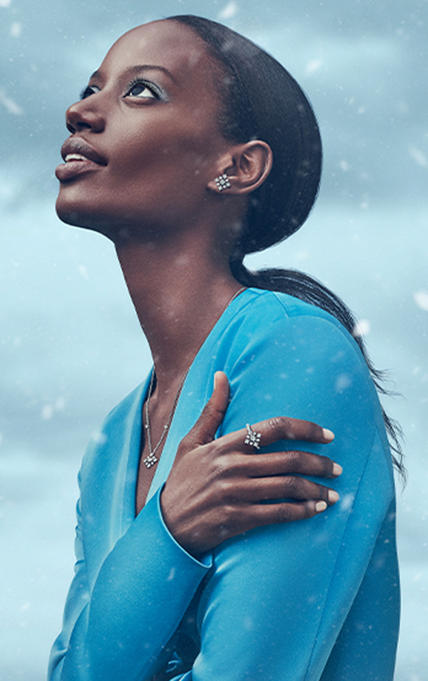 Model wearing birks snowflake jewelry