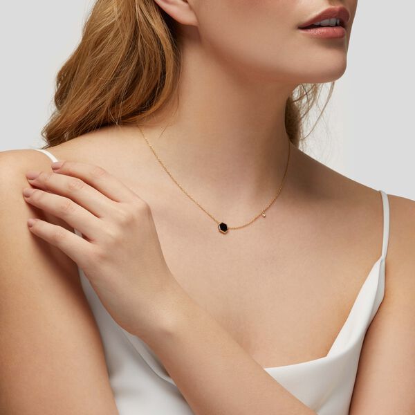 Onyx pendant with diamond accent