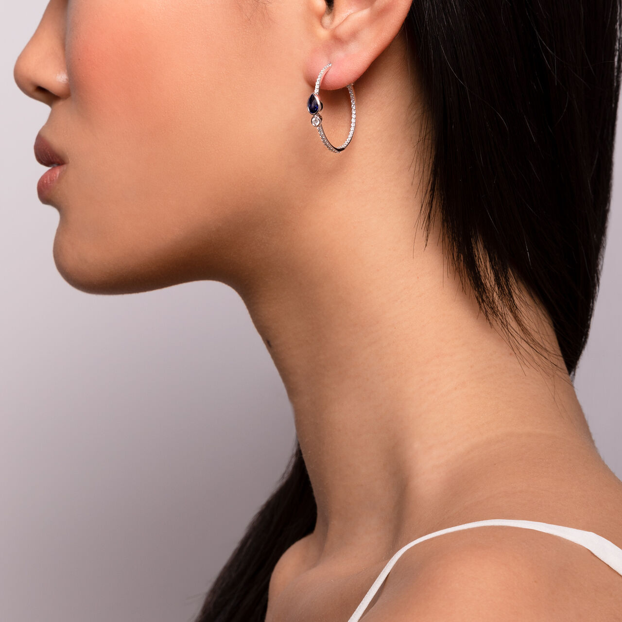 Splash Diamond and Sapphire Medium Hoop Earrings on model image number 1